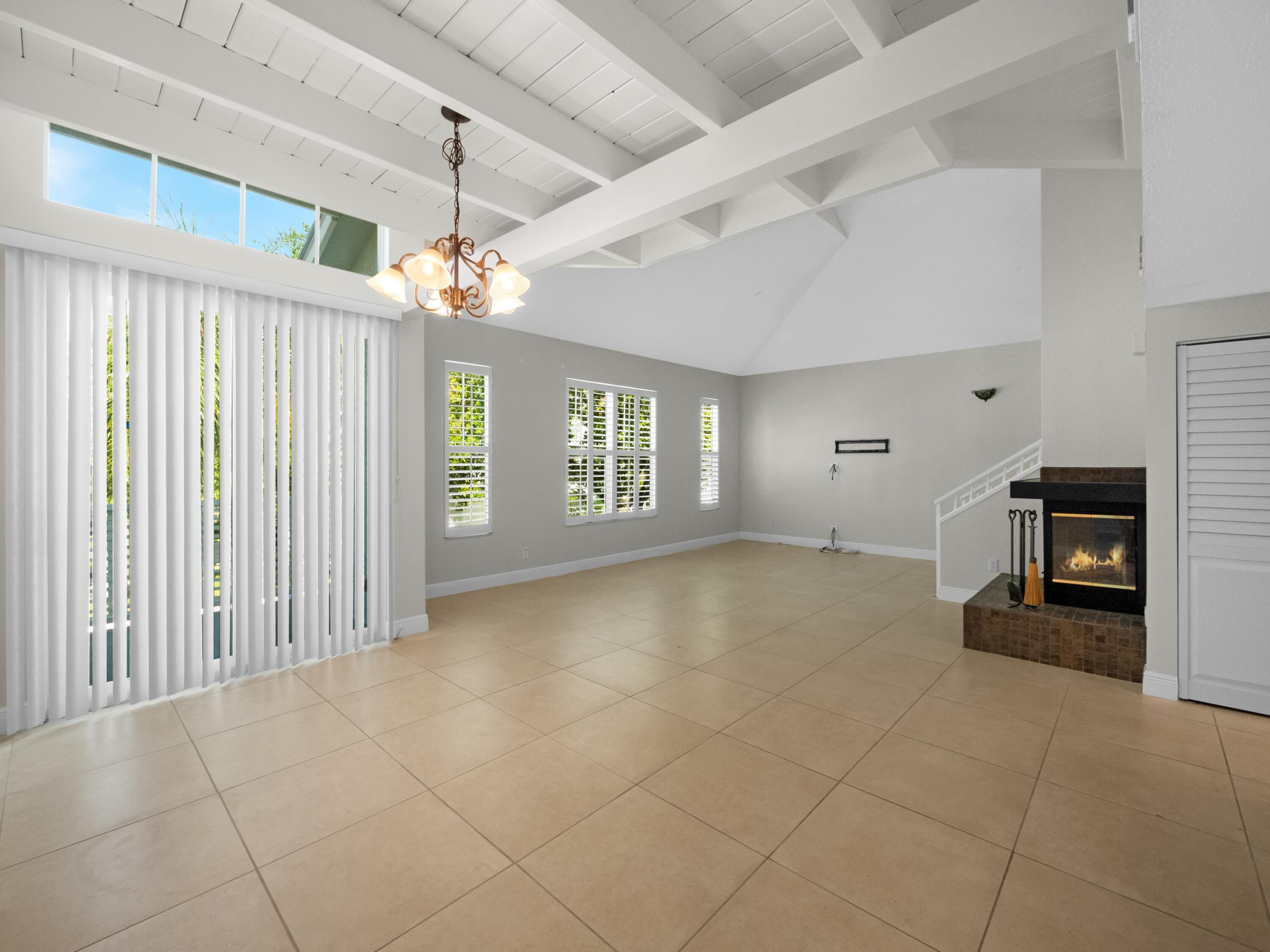 501 Mainsail Circle Jupiter, FL 33477 - Photo 4 of 29 a view of an empty room with a window