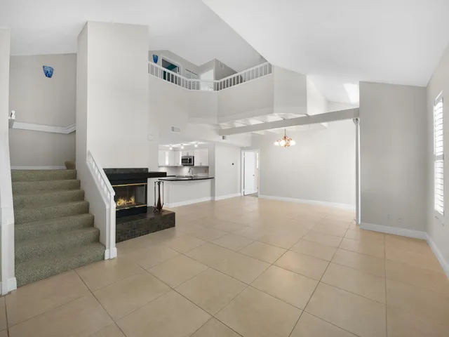 a view of kitchen with cabinets and wooden floor