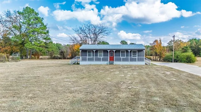 a view of a house with a garden