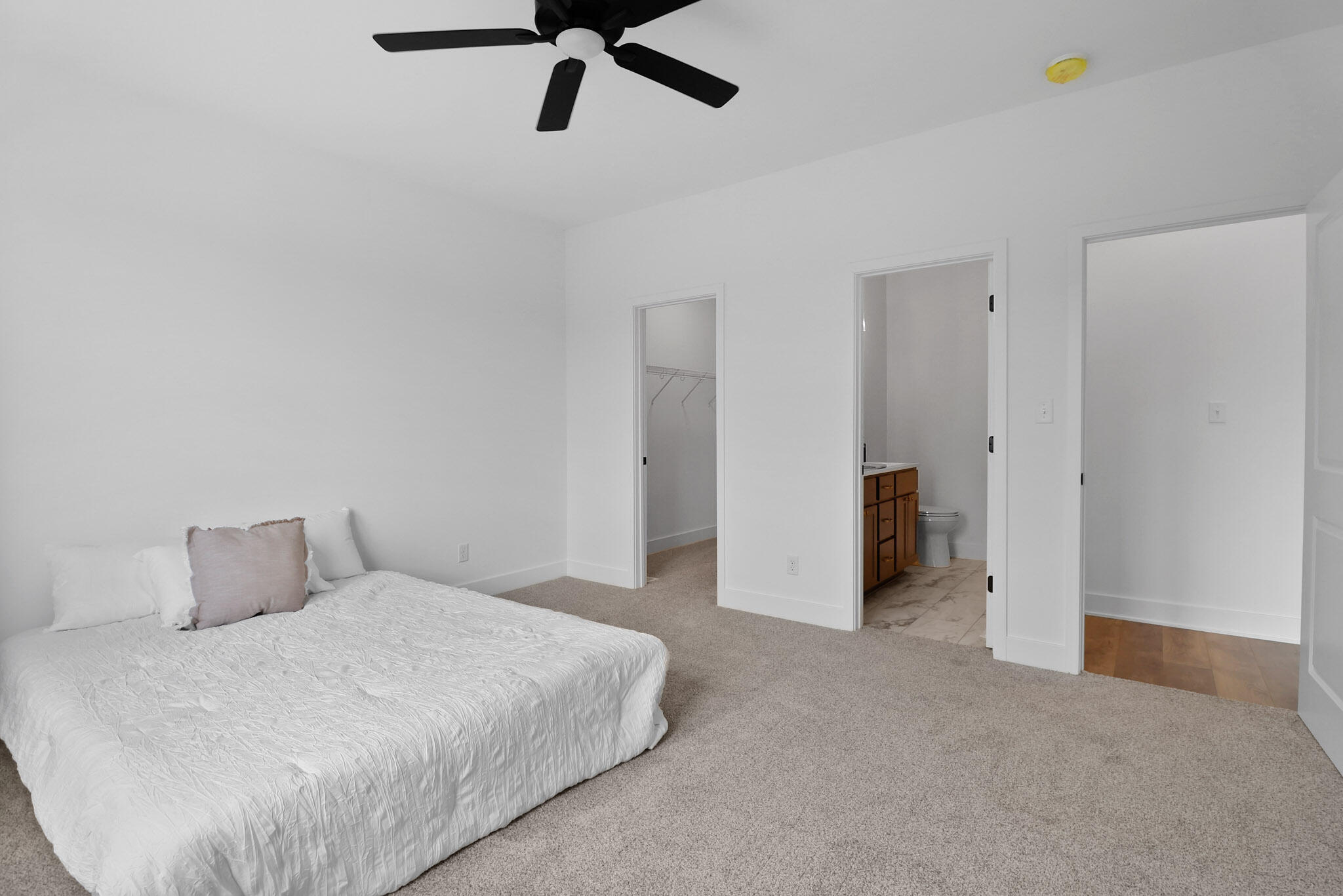 2183 Foley Street Portage, IN 46368 - Photo 14 of 22 a bedroom with a bed and cabinets