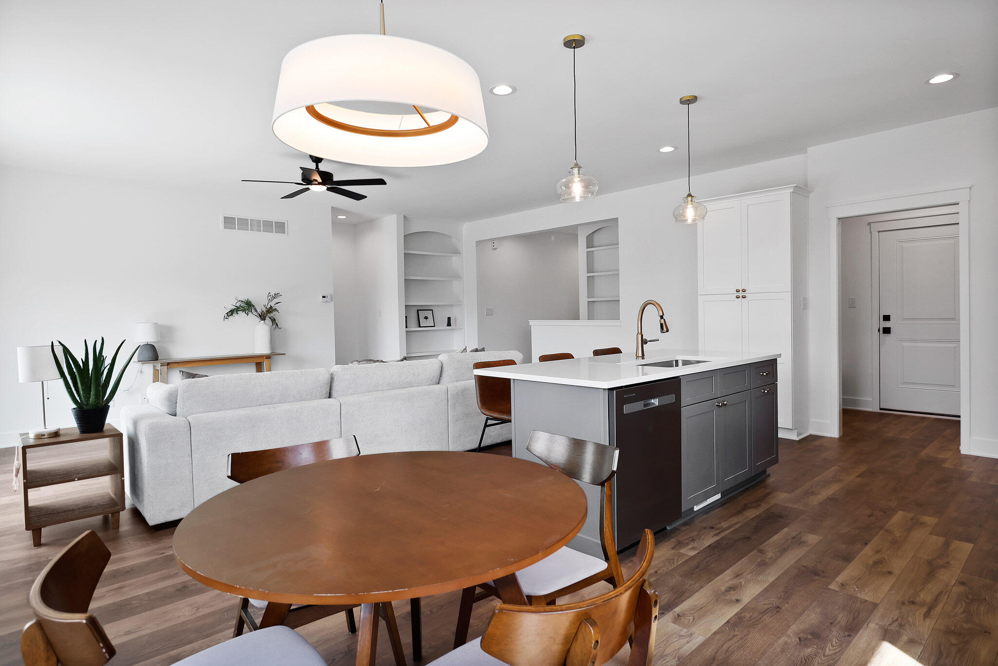 2183 Foley Street Portage, IN 46368 - Photo 7 of 22 a kitchen with a table chairs sink and cabinets