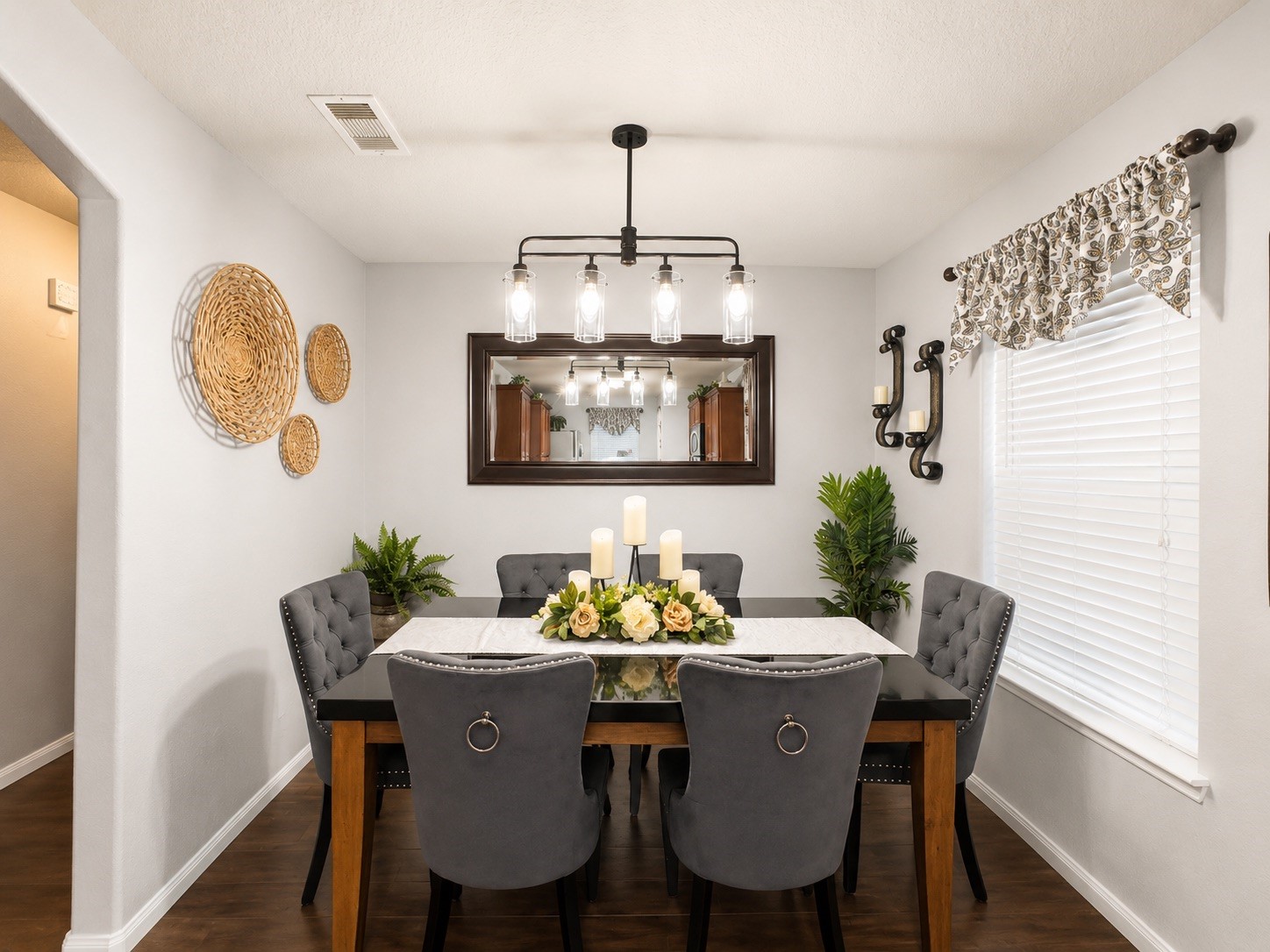 9911 Bronze Mill Lane Rosharon, TX 77583 - Photo 8 of 15 Enjoy a dedicated dining space with natural light and easy access to the heart of the home, perfect for everyday meals or entertaining.