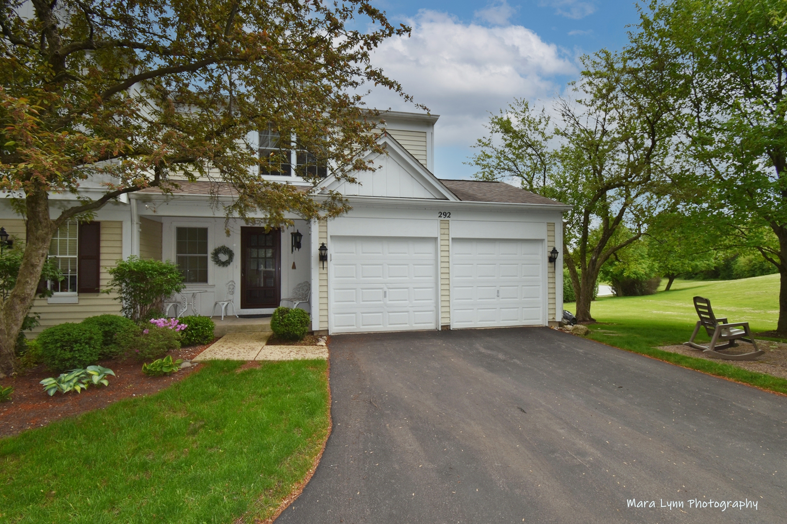 292 Cane Garden Circle Aurora, IL 60504 - Photo 1 of 44 a front view of a house with a yard and garage