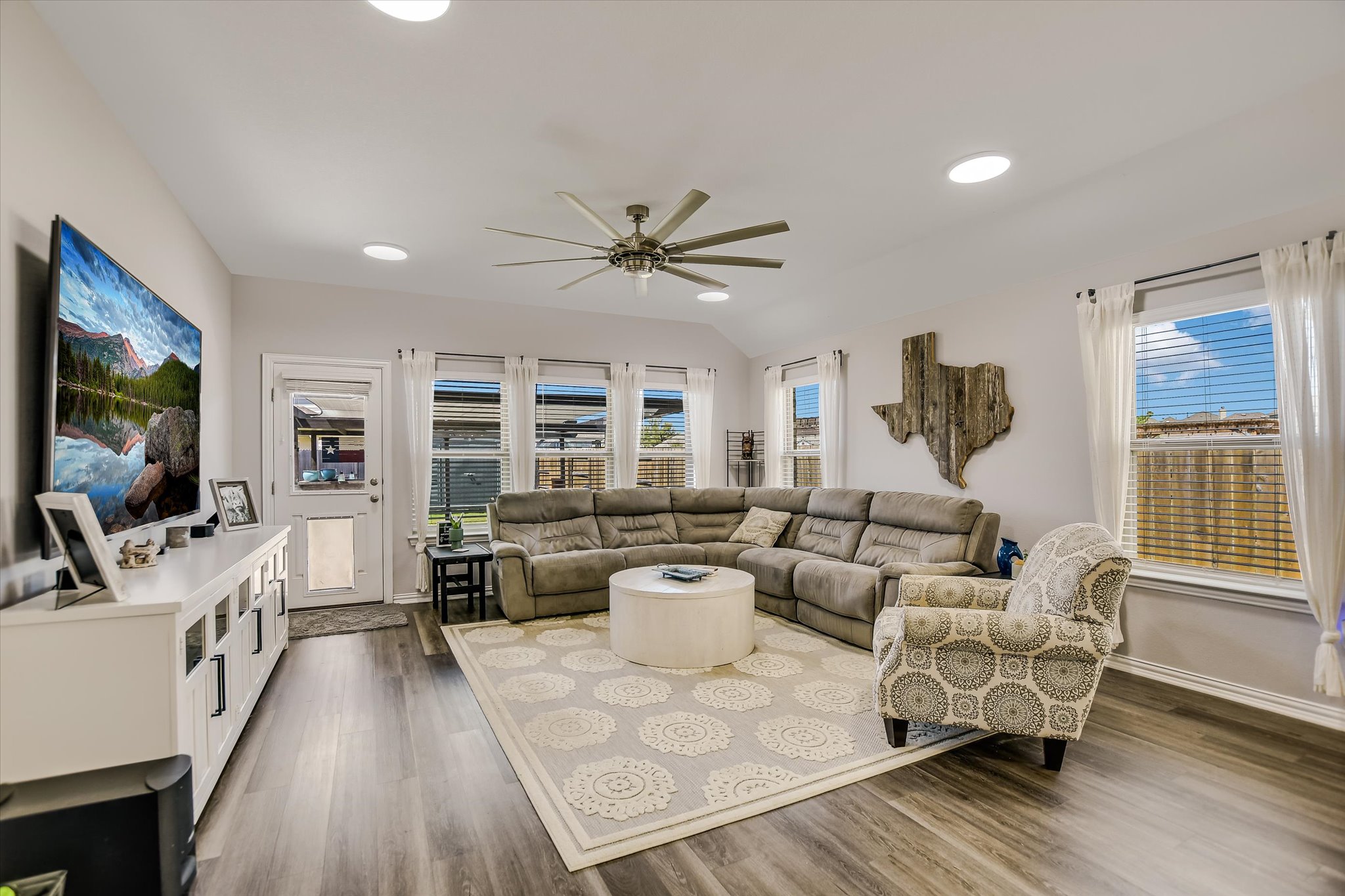 1101 Terrace View Drive Georgetown, TX 78628 - Photo 3 of 20 Living room featuring a ceiling fan, wood finished floors, lofted ceiling, and recessed lighting