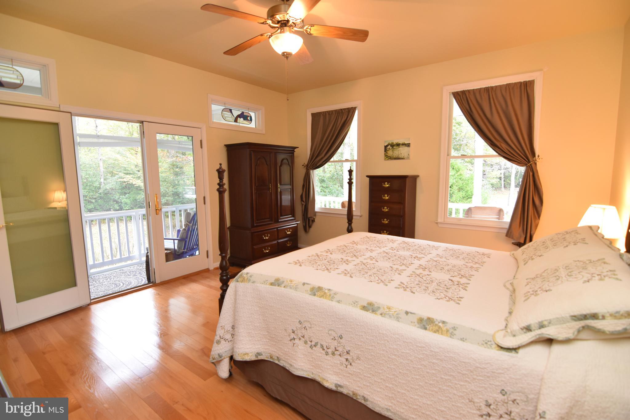17622 Point Lookout Road Lexington Park, MD 20653 - Photo 28 of 82 Main level bedroom has French doors to porch