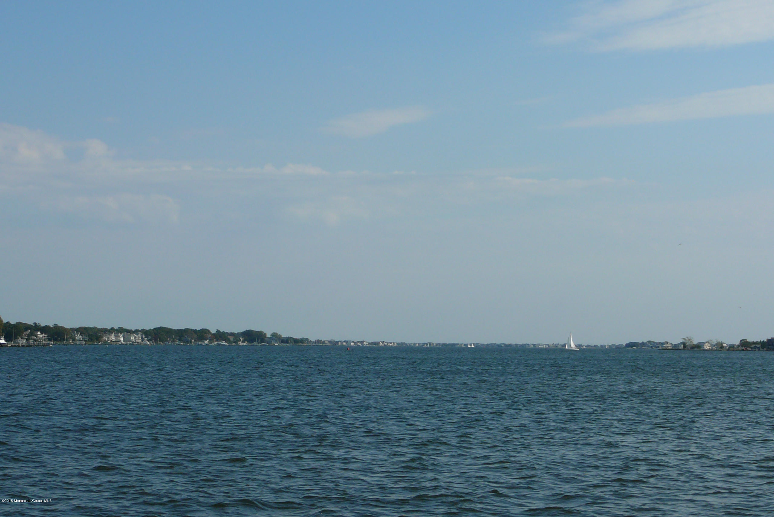 79 Metedeconk Road Brick, NJ 08723 - Photo 4 of 7 a view of lake and mountain view