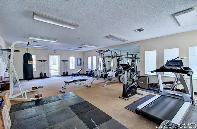 a view of a room with gym equipment