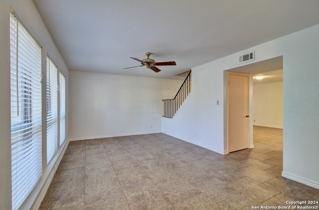 6810 Crown Ridge San Antonio, TX 78239 - Photo 14 of 34 a view of a livingroom with a ceiling fan and window