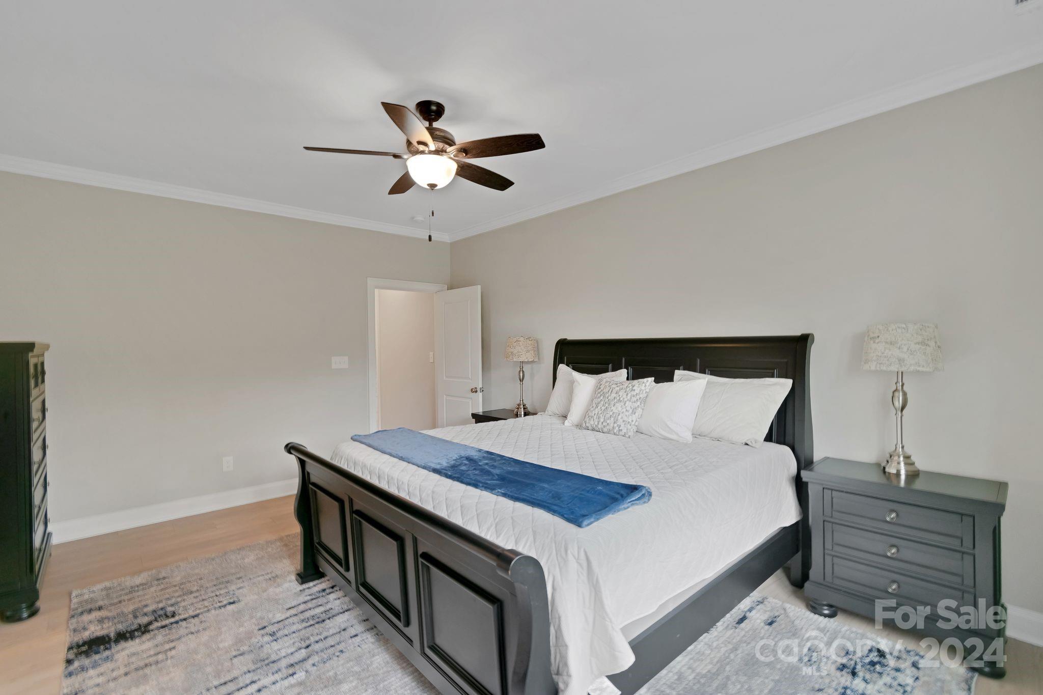 2795 Craig Farm Road Lancaster, SC 29720 - Photo 16 of 44 a bedroom with a bed and a dresser