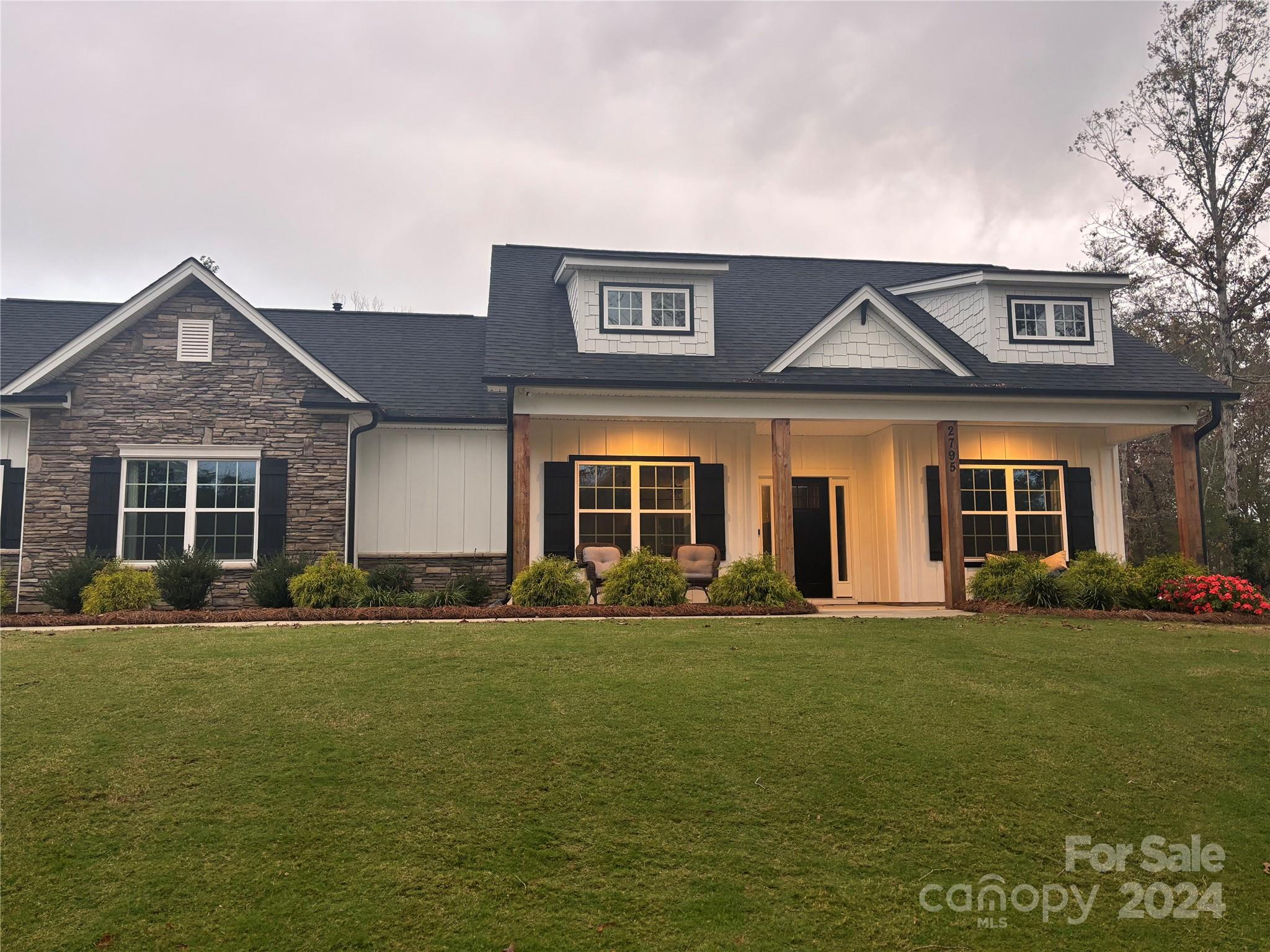 2795 Craig Farm Road Lancaster, SC 29720 - Photo 3 of 44 a front view of a house with a yard