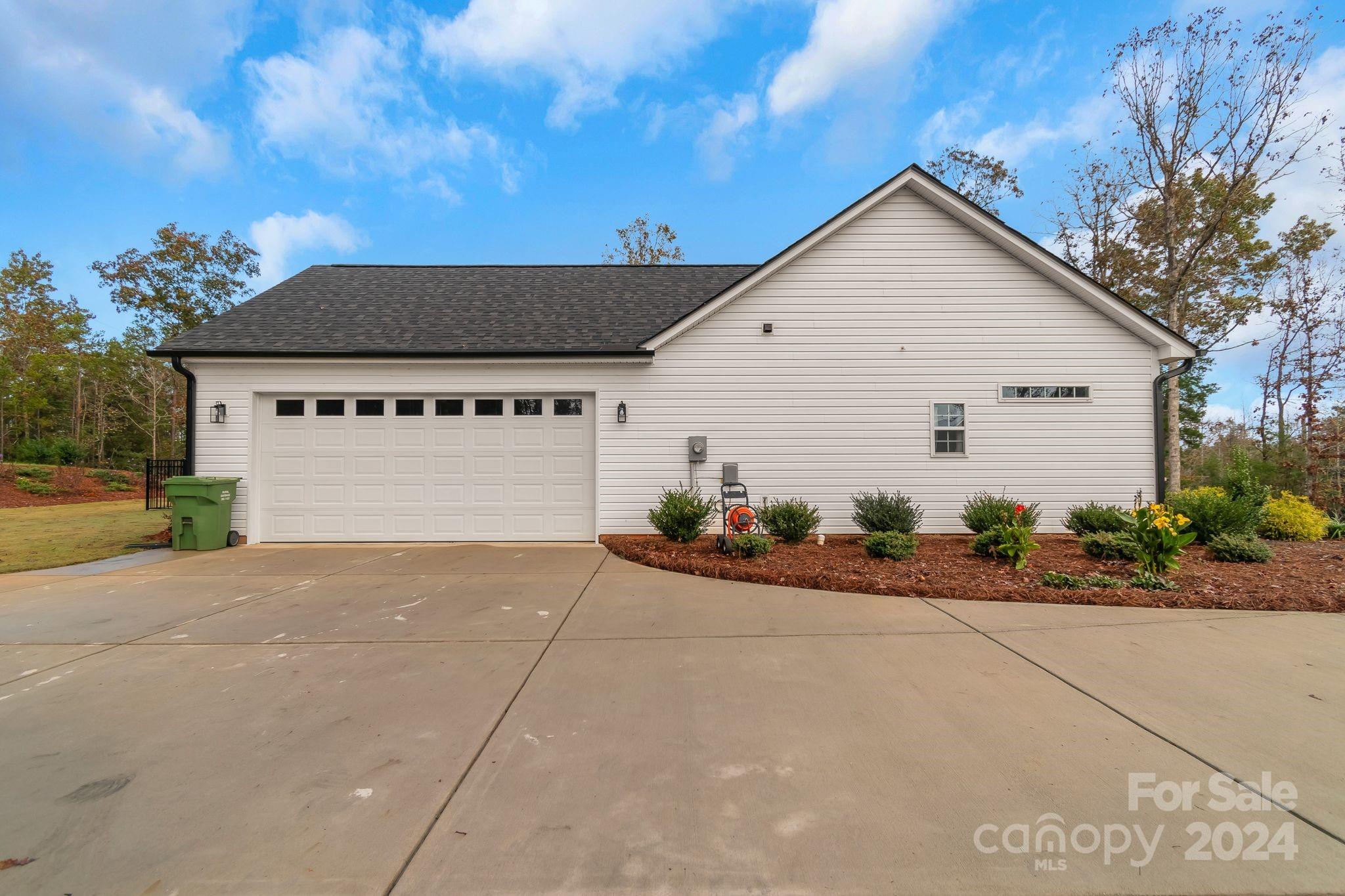 2795 Craig Farm Road Lancaster, SC 29720 - Photo 31 of 44 a front view of a house with a yard and garage