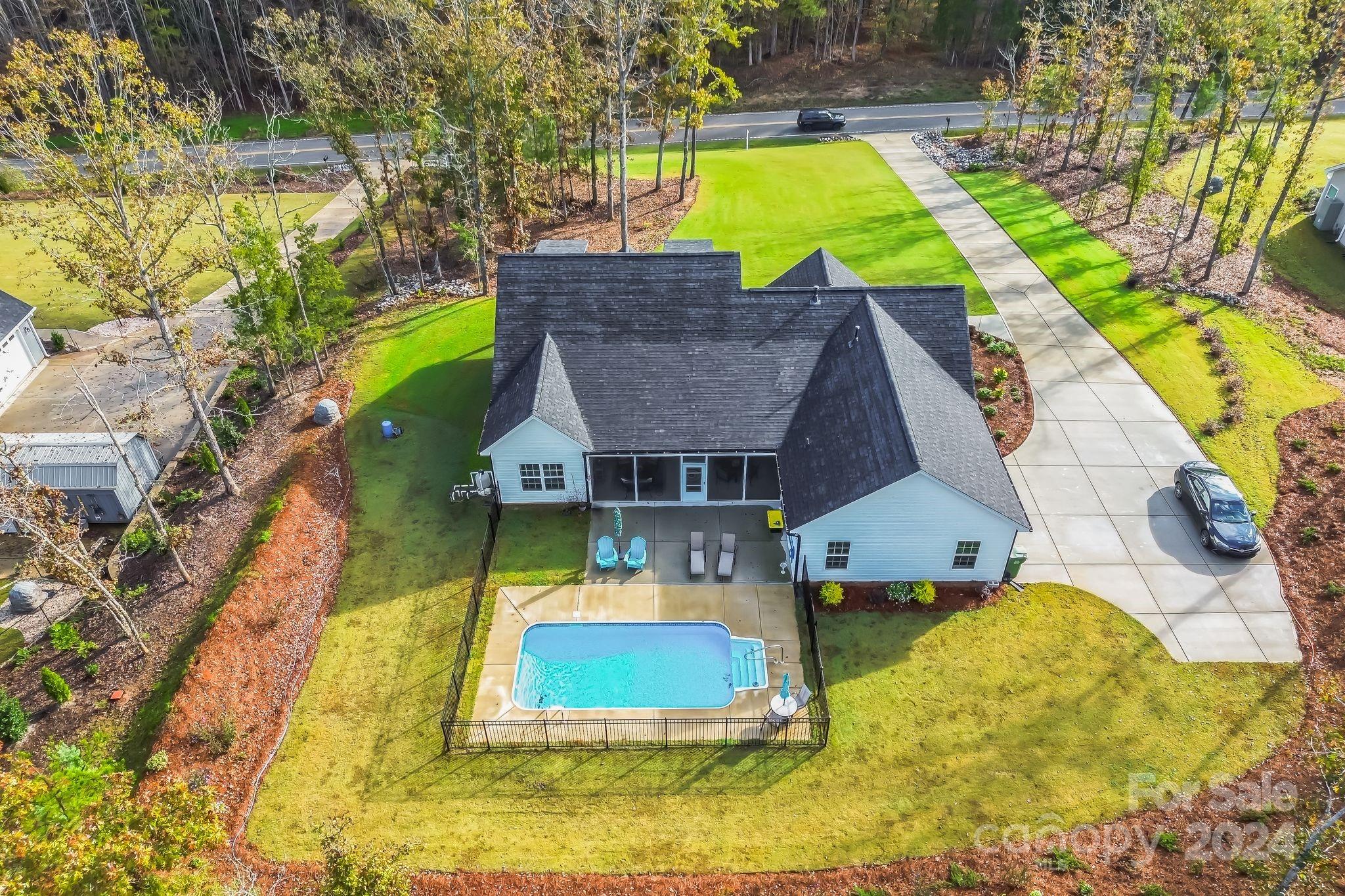 2795 Craig Farm Road Lancaster, SC 29720 - Photo 38 of 44 an aerial view of residential houses with swimming pool