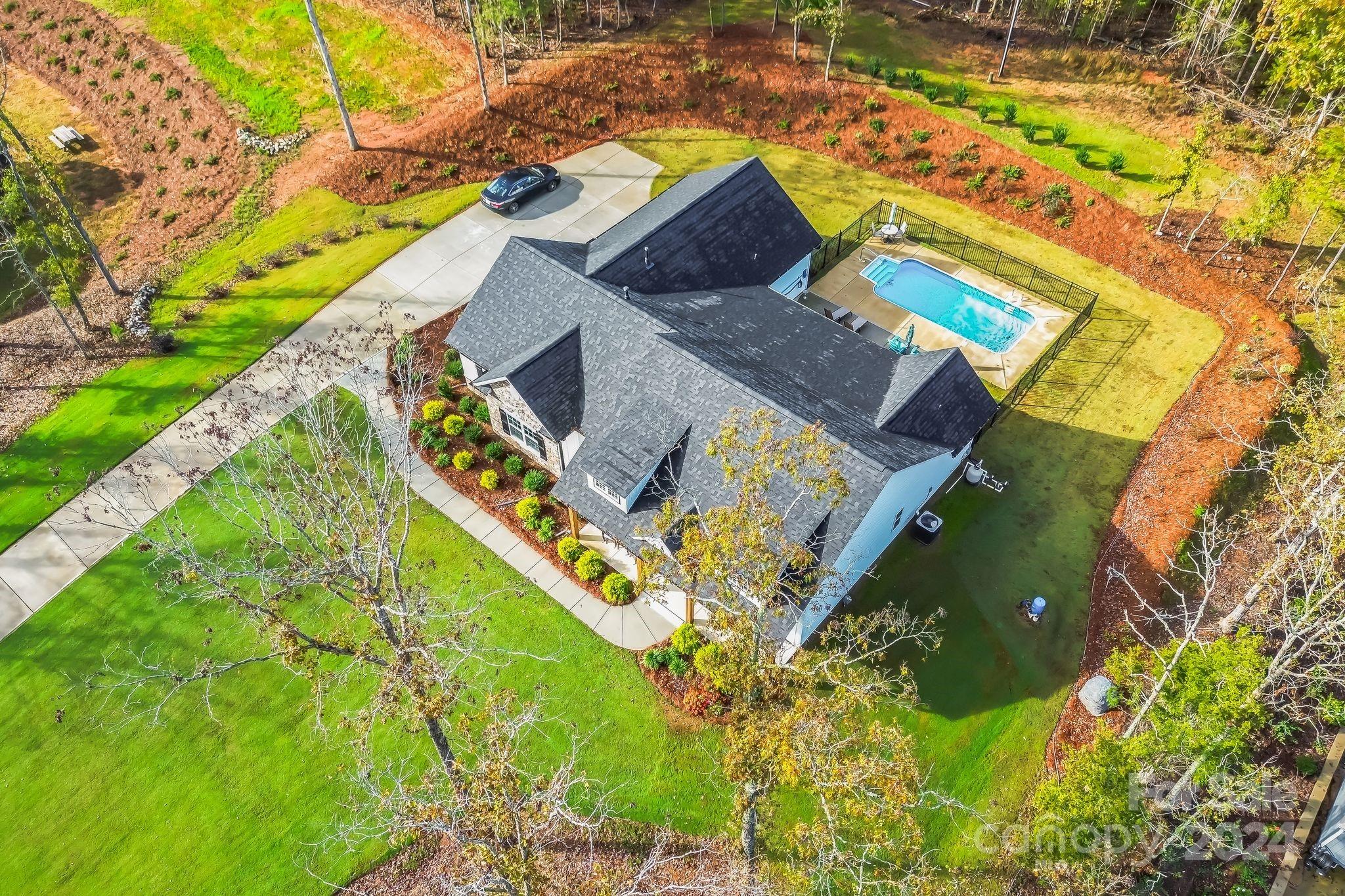 2795 Craig Farm Road Lancaster, SC 29720 - Photo 39 of 44 an aerial view of a house with a yard and swimming pool