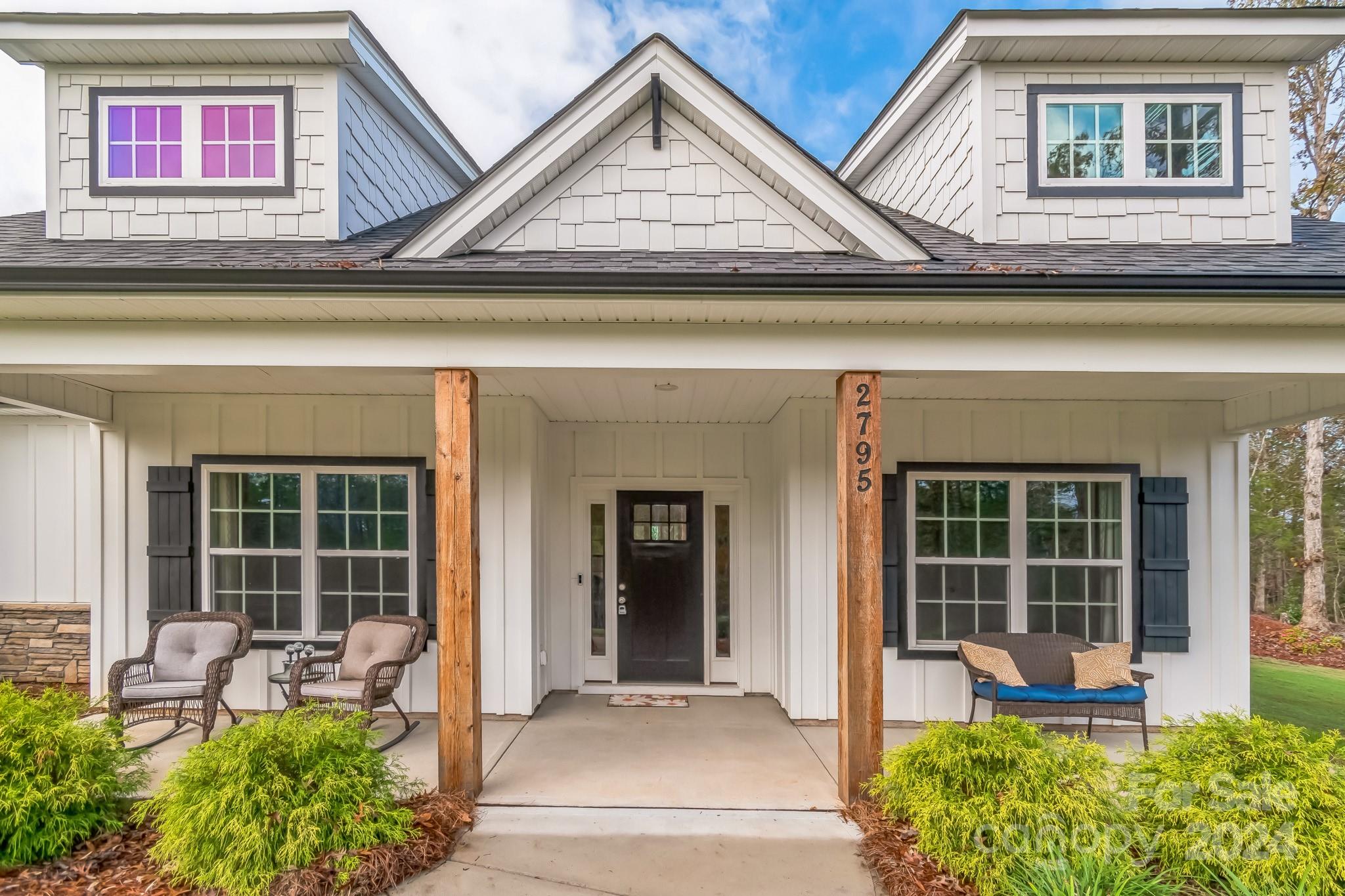 2795 Craig Farm Road Lancaster, SC 29720 - Photo 4 of 44 a view of a house with outdoor seating space and garden