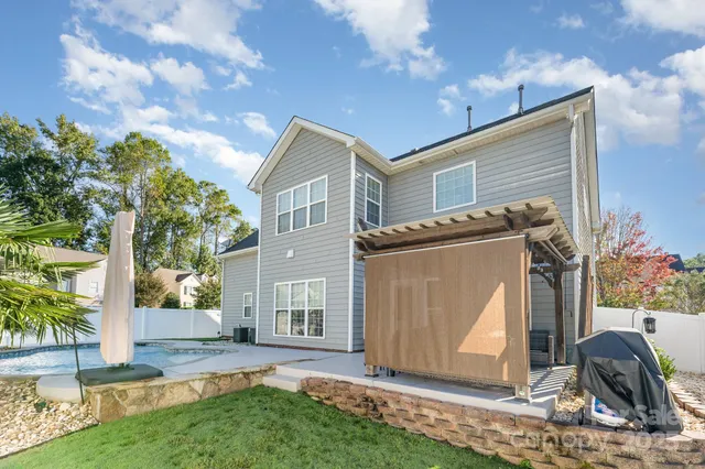 a view of backyard with a garden and plants
