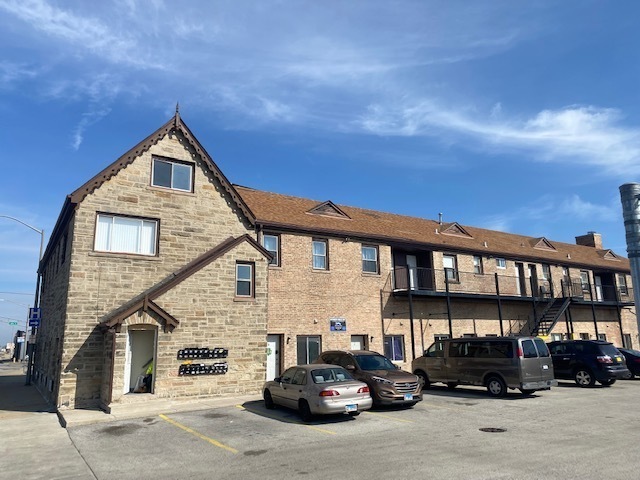 171 25th Avenue, Unit 4S Melrose Park, IL 60160 - Photo 1 of 11 a car parked in front of a house