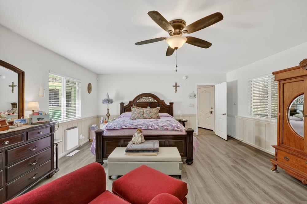 2026 Lily Valley Way West Point, CA 95255 - Photo 32 of 39 a bedroom with furniture and a window