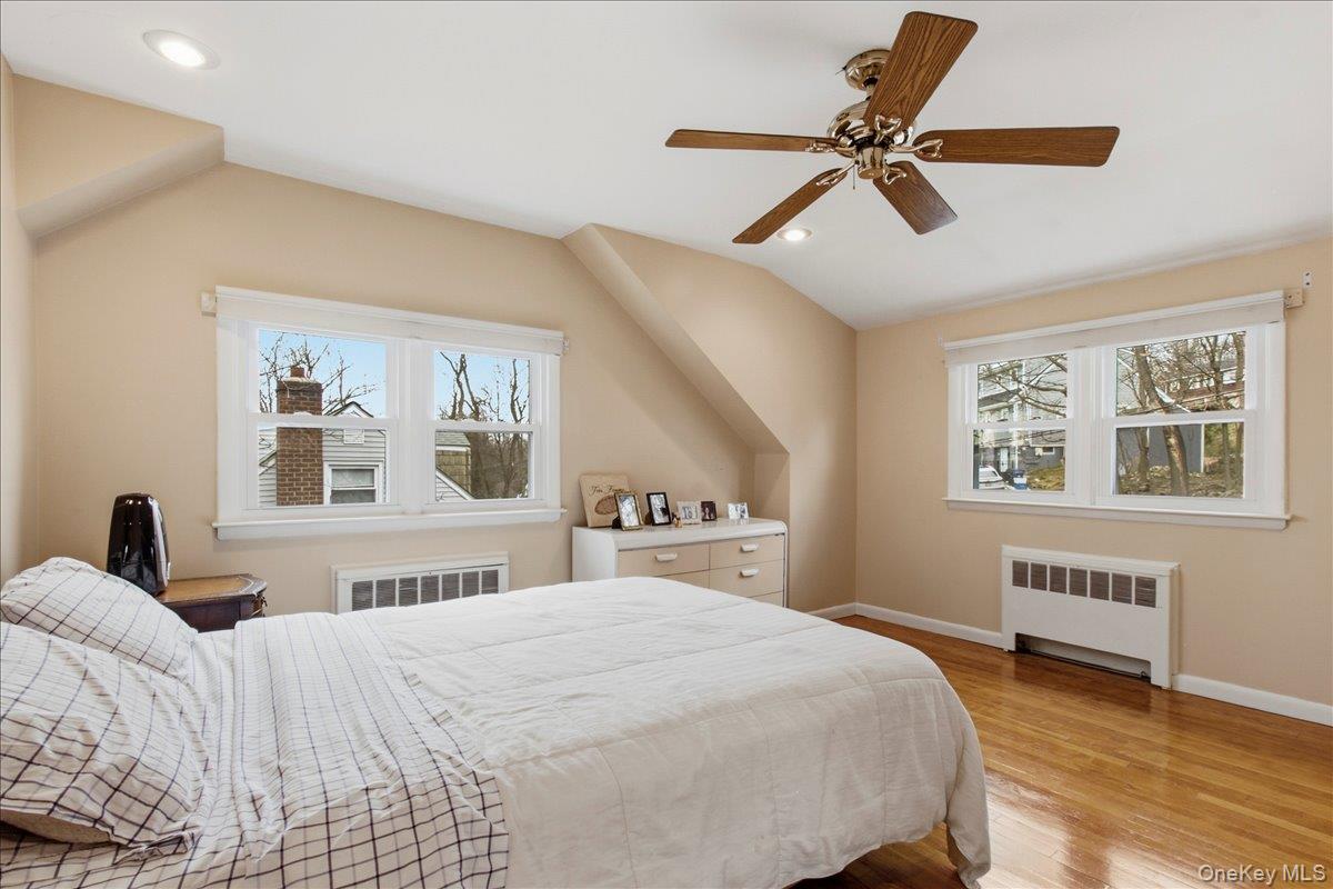 169 Canterbury Road White Plains, NY 10607 - Photo 13 of 27 a bedroom with a large bed and a window
