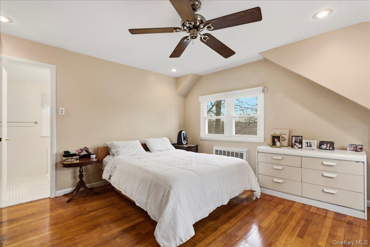 169 Canterbury Road White Plains, NY 10607 - Photo 14 of 27 a bedroom with a bed and a window
