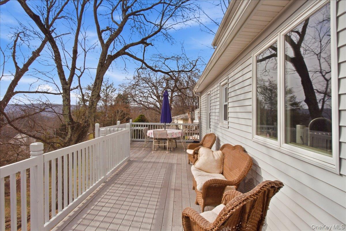 169 Canterbury Road White Plains, NY 10607 - Photo 18 of 27 a view of a chairs and tables in the balcony