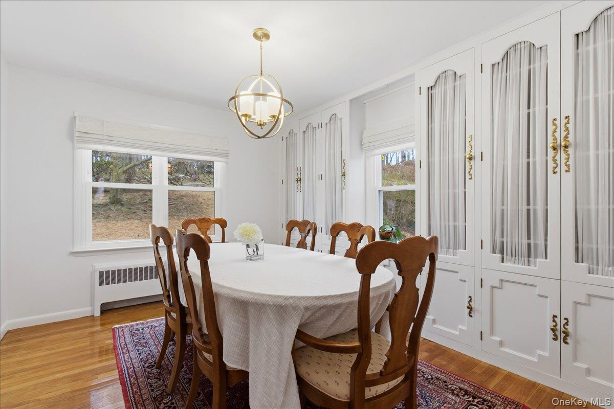 169 Canterbury Road White Plains, NY 10607 - Photo 6 of 27 a view of a dining room with furniture window and wooden floor