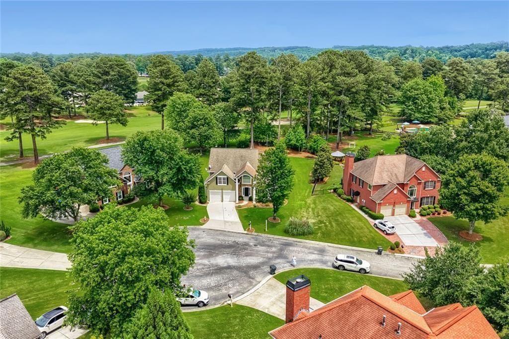 3413 Doe's Court Villa Rica, GA 30180 - Photo 4 of 37 an aerial view of a house with garden space and street view