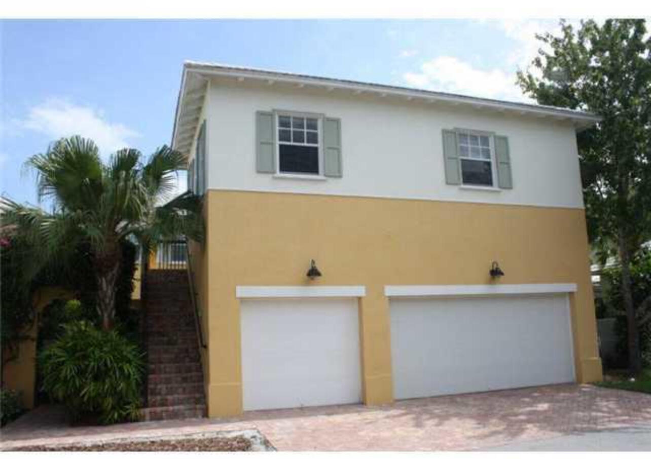 113 Inkberry Drive Jupiter, FL 33458 - Photo 1 of 4 a front view of a house with yard