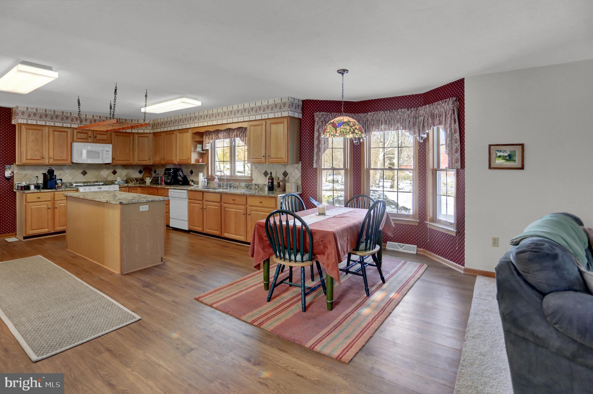 501 Knight Road Gettysburg, PA 17325 - Photo 14 of 37 a dining room with furniture and wooden floor