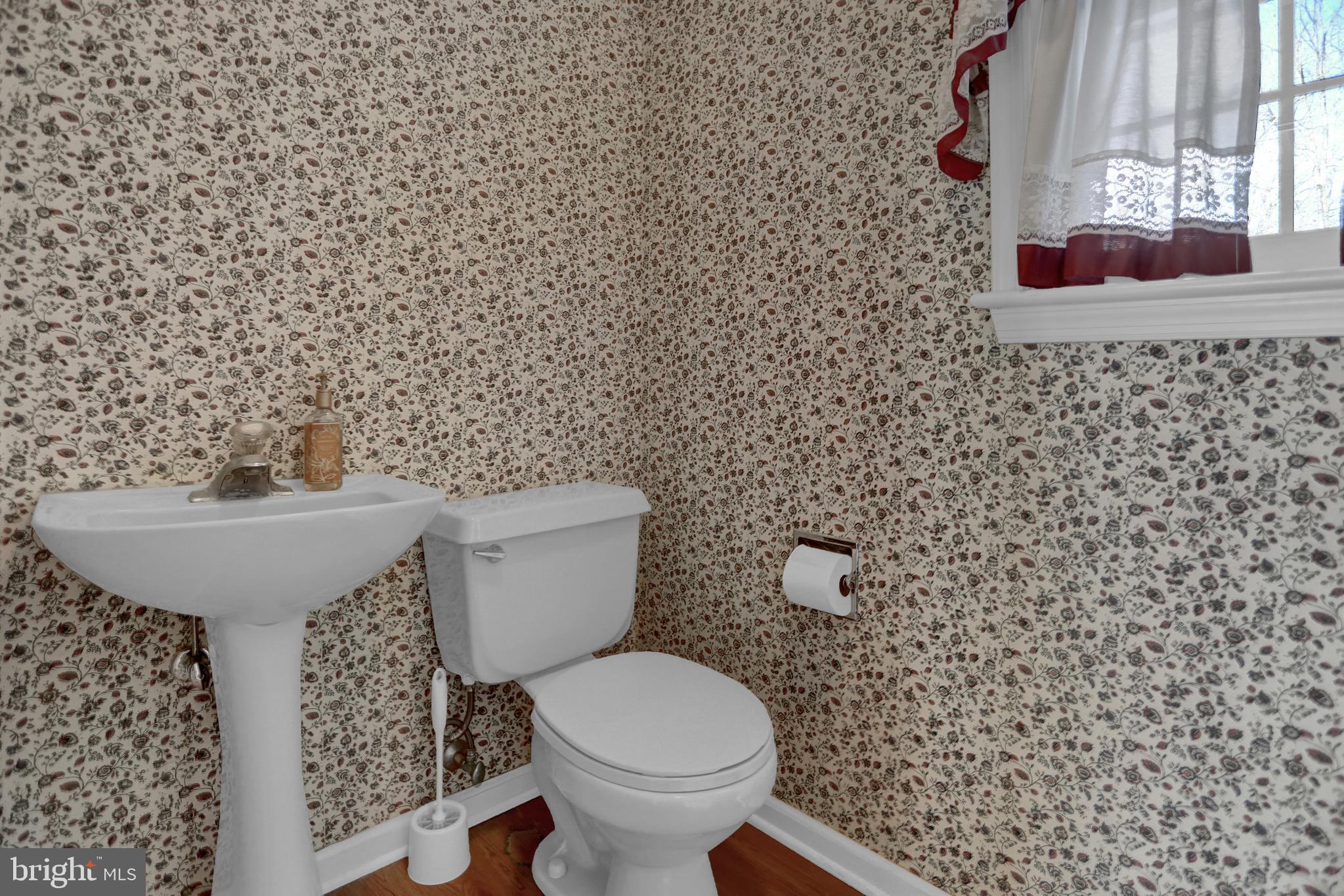 501 Knight Road Gettysburg, PA 17325 - Photo 18 of 37 a bathroom with a toilet and a sink