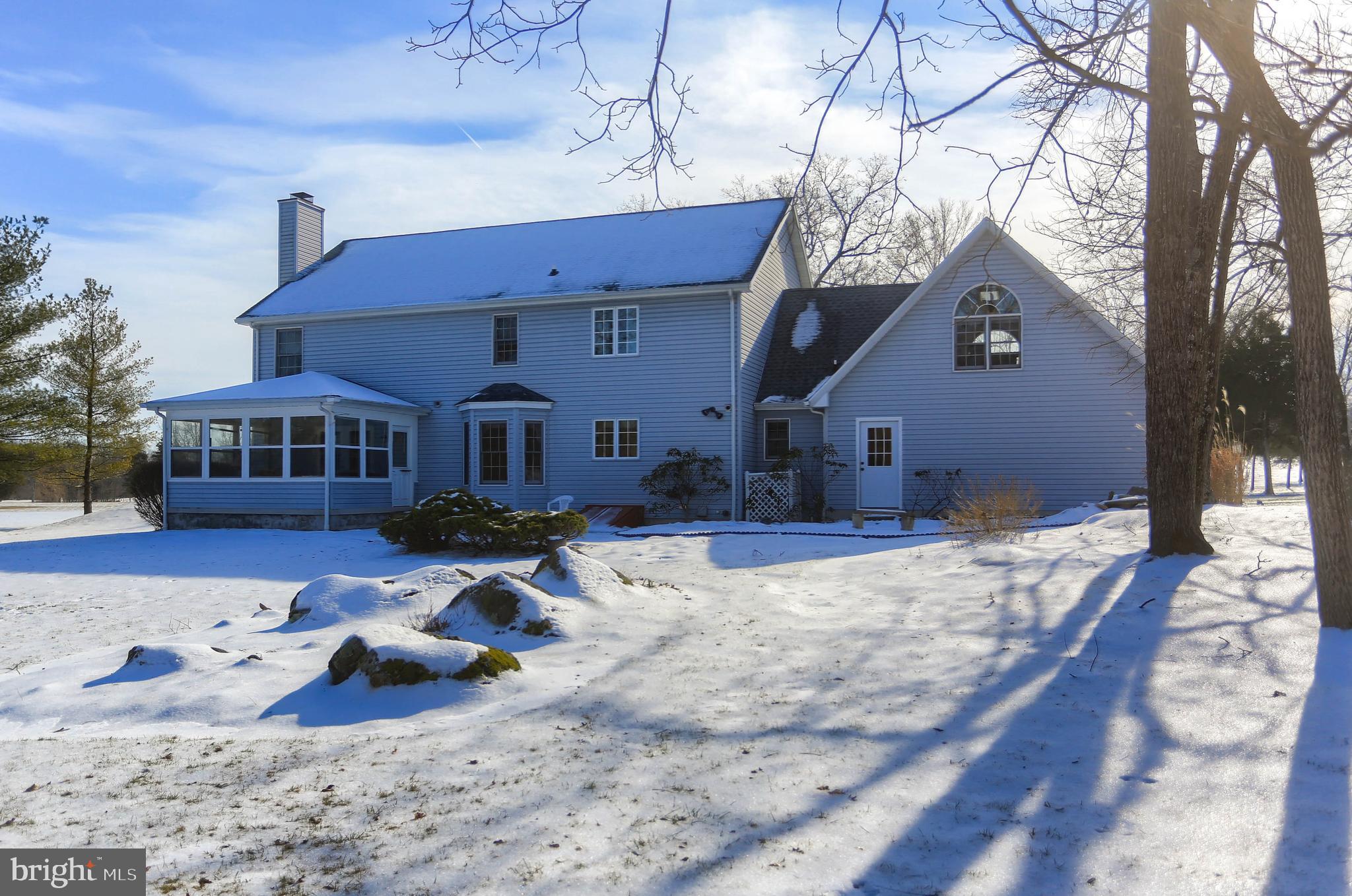 501 Knight Road Gettysburg, PA 17325 - Photo 34 of 37 a front view of a house with a yard covered in snow