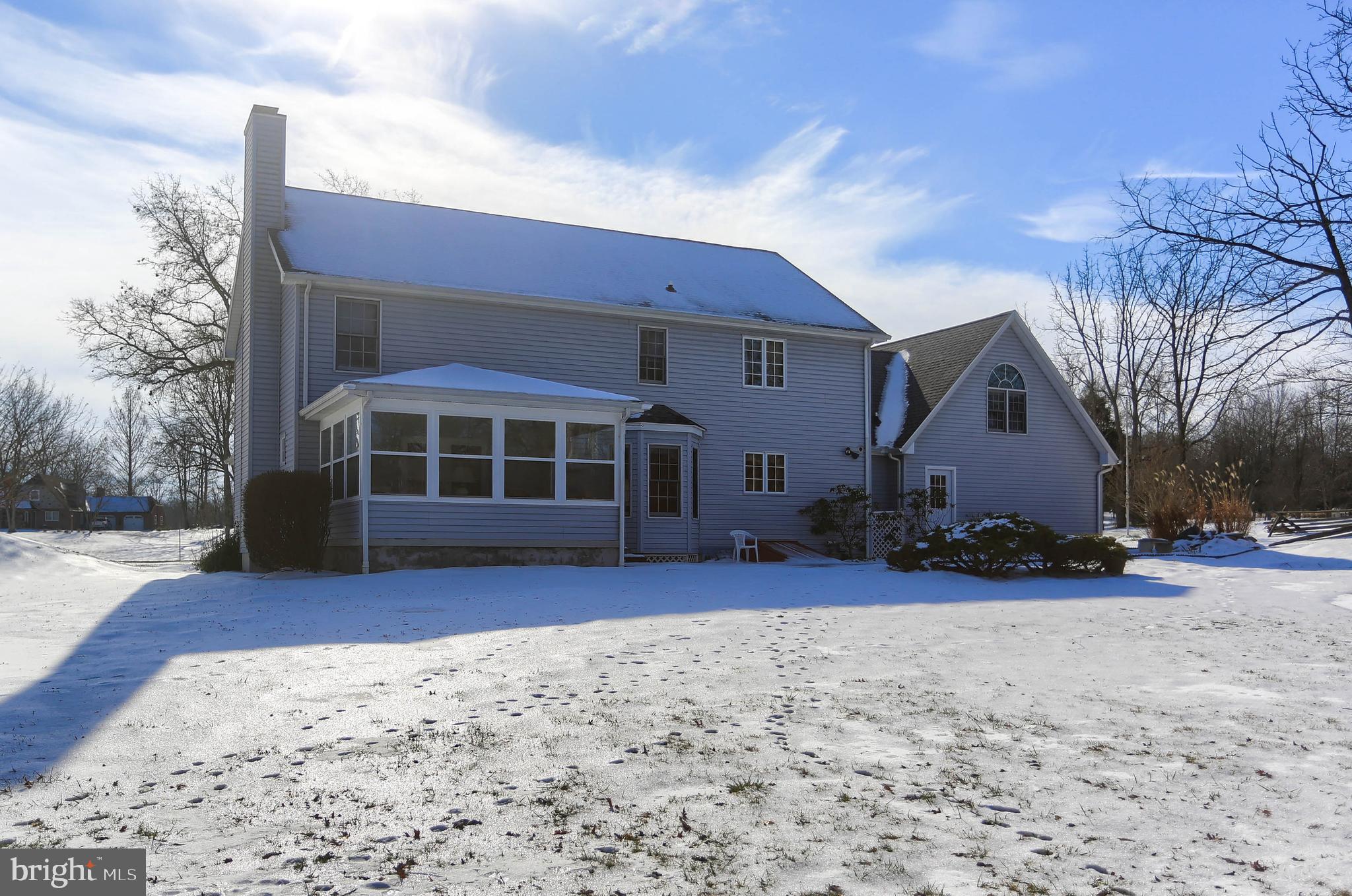 501 Knight Road Gettysburg, PA 17325 - Photo 35 of 37 a front view of a house with a yard covered in snow