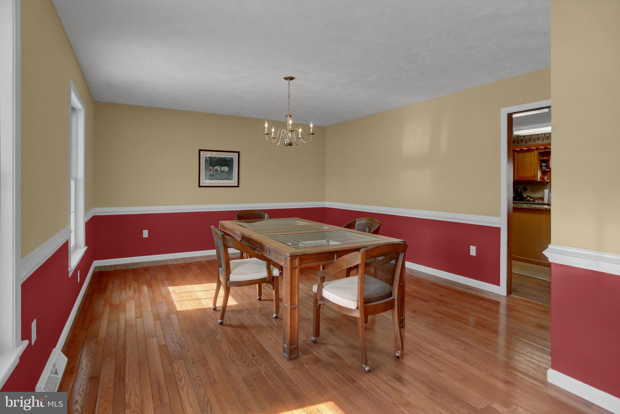 501 Knight Road Gettysburg, PA 17325 - Photo 5 of 37 a view of a dining room with furniture and chandelier