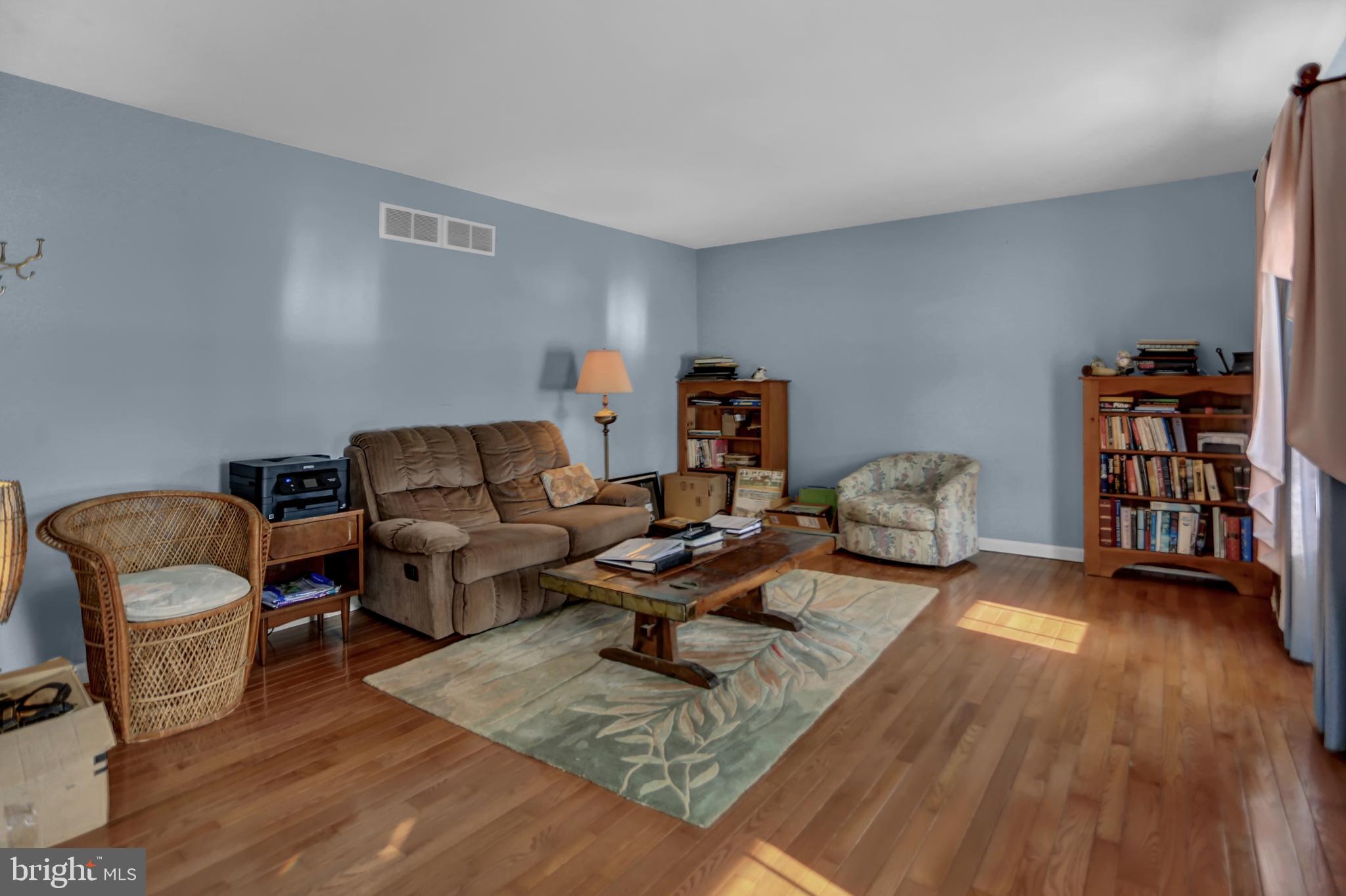501 Knight Road Gettysburg, PA 17325 - Photo 8 of 37 a living room with furniture and wooden floor