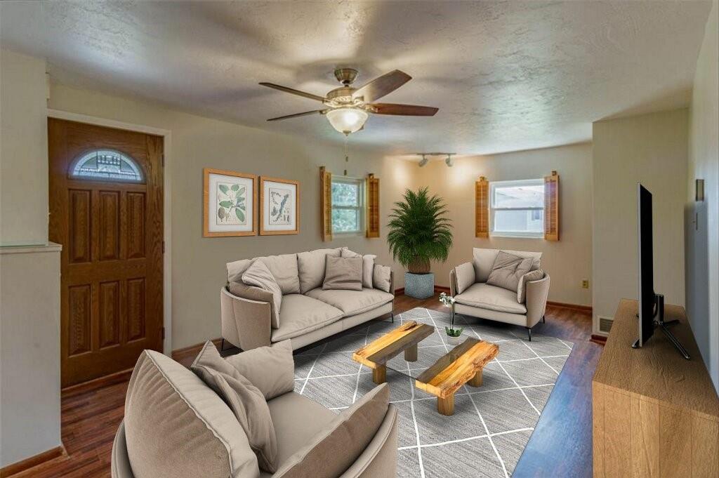 803 Cliff Mine Road Imperial, PA 15126 - Photo 2 of 24 a living room with furniture and a flat screen tv