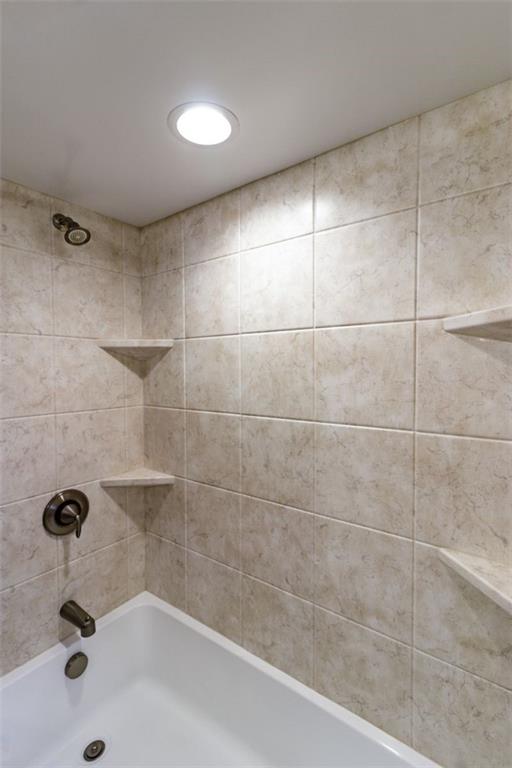 803 Cliff Mine Road Imperial, PA 15126 - Photo 15 of 24 a bathroom with a bathtub and a shower