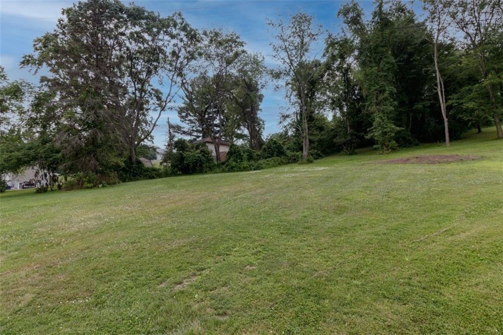 803 Cliff Mine Road Imperial, PA 15126 - Photo 23 of 24 a view of a field with a trees