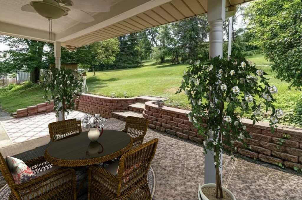 803 Cliff Mine Road Imperial, PA 15126 - Photo 6 of 24 a view of a patio with table and chairs and potted plants