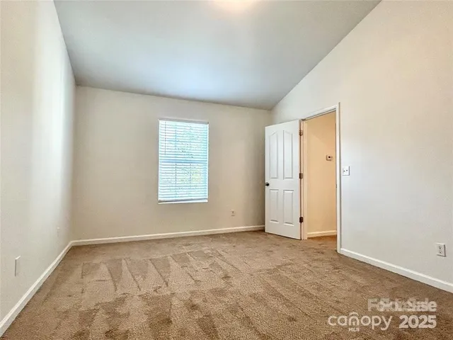 a white toilet sitting next to a bath tub