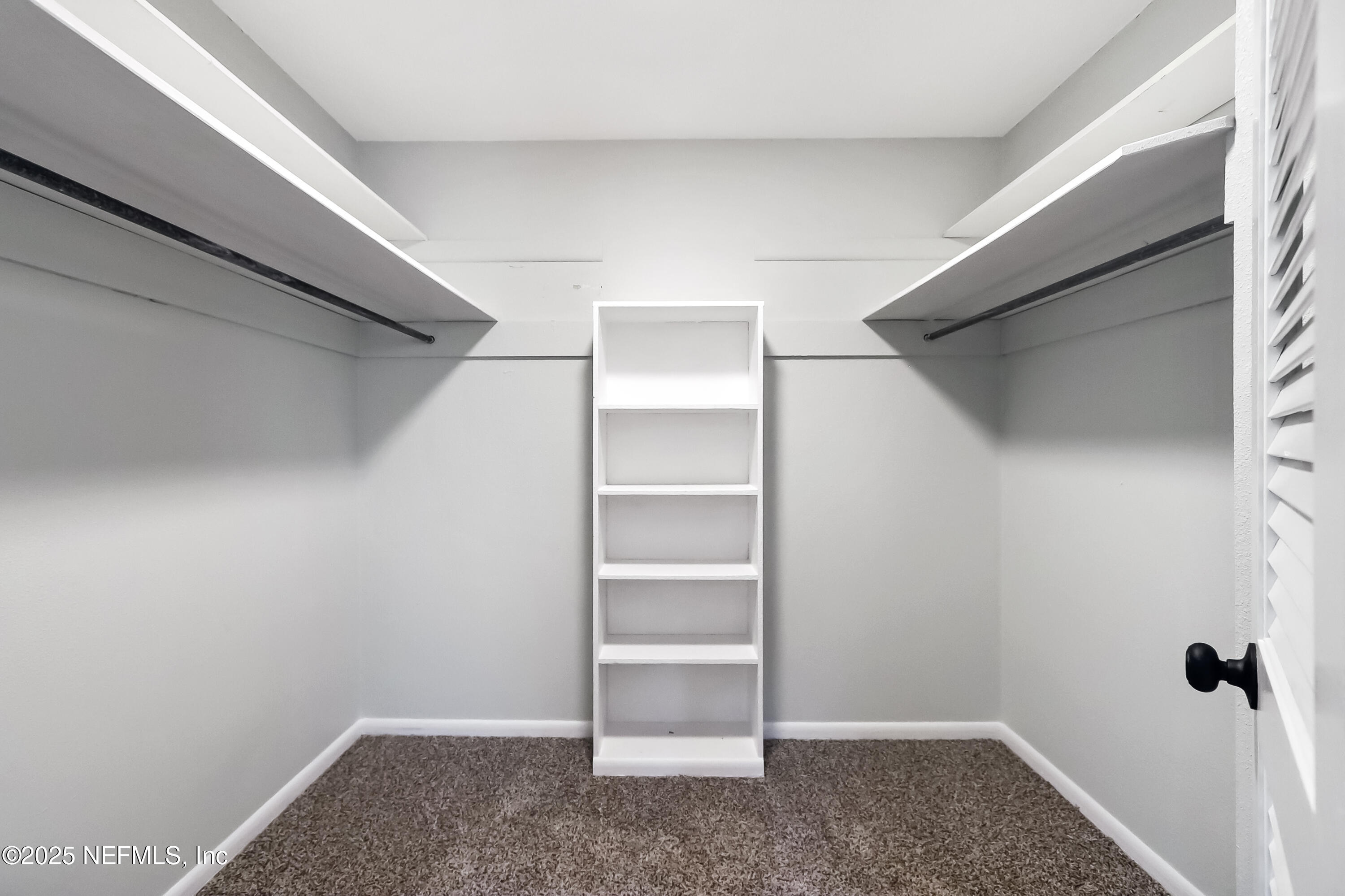 8837 Runnymeade Road Jacksonville, FL 32257 - Photo 48 of 55 a view of an empty walk in closet