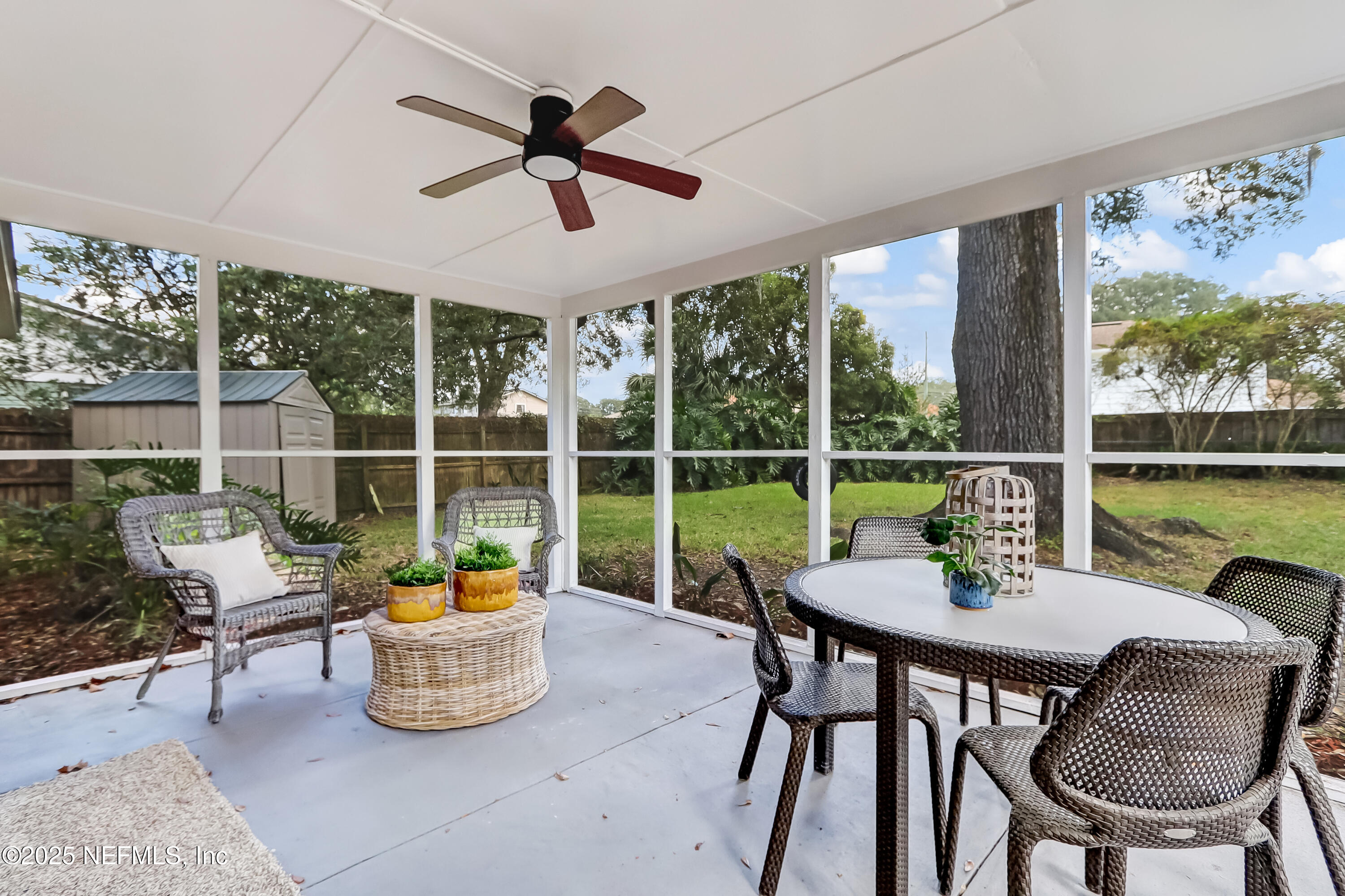 8837 Runnymeade Road Jacksonville, FL 32257 - Photo 51 of 55 a view of a dining room with furniture window and outside view