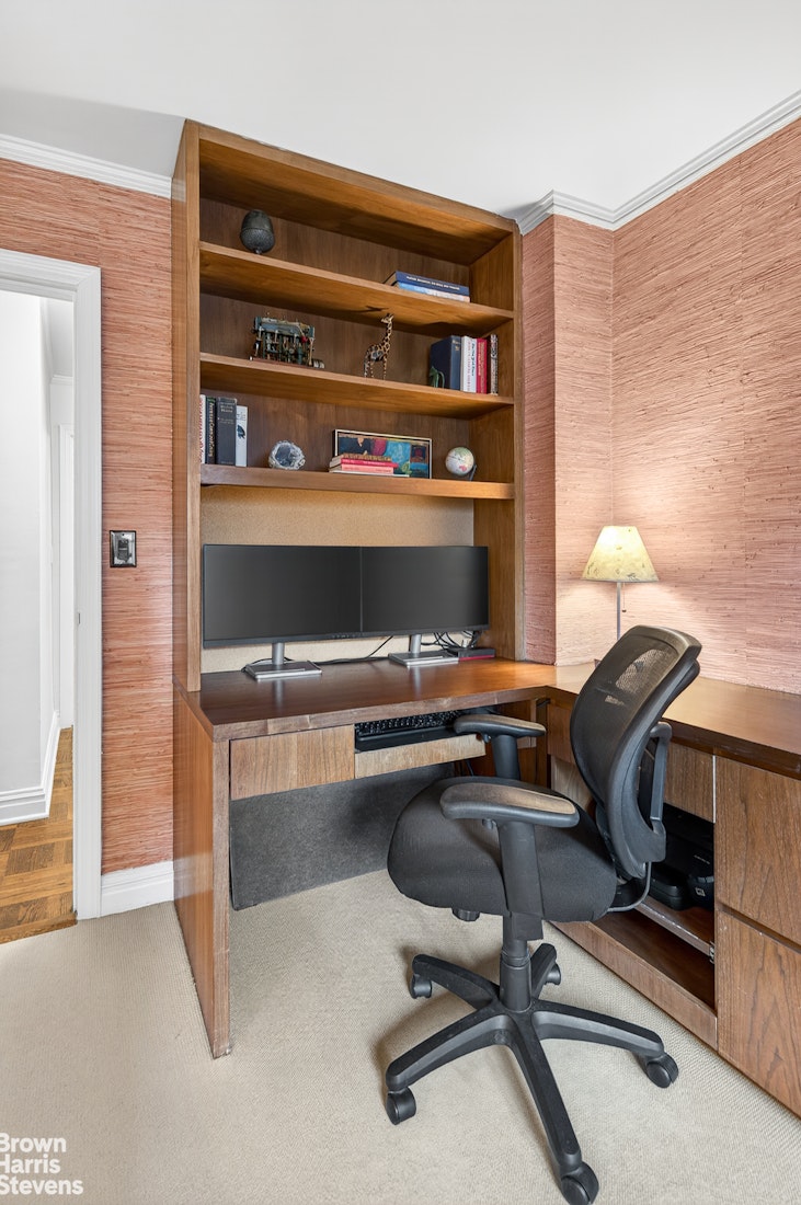 167 East 67th Street, Unit 8A Manhattan, NY 10065 - Photo 13 of 19 a workspace with a couch