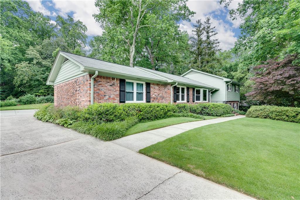1415 Altamont Drive Decatur, GA 30033 - Photo 1 of 1 a front view of a house with a yard