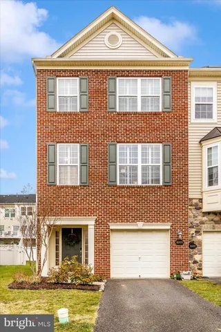a view of a swimming pool with outdoor seating
