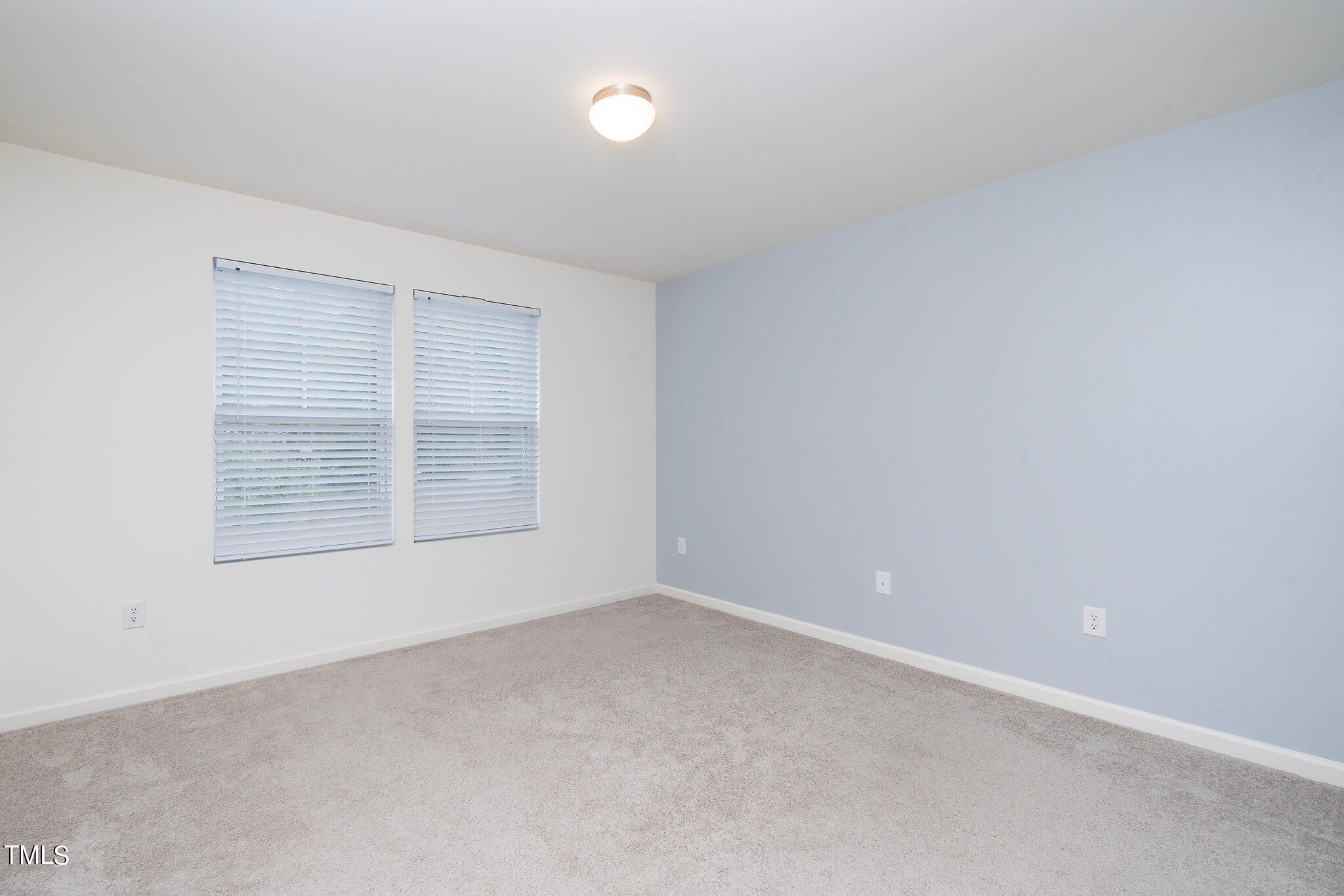 1060 North Gibson Road Mebane, NC 27302 - Photo 16 of 34 an empty room with a window