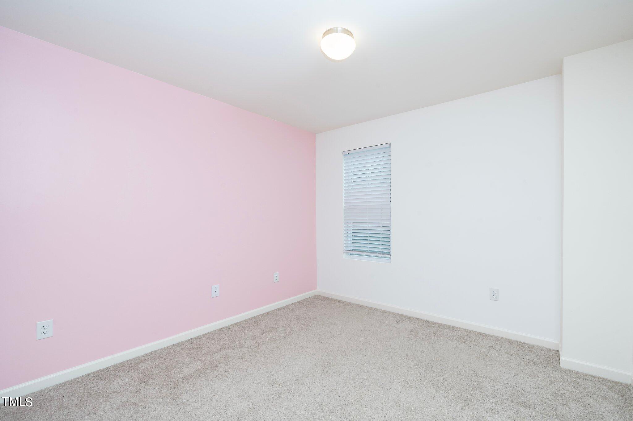 1060 North Gibson Road Mebane, NC 27302 - Photo 21 of 34 an empty room with a empty space and window