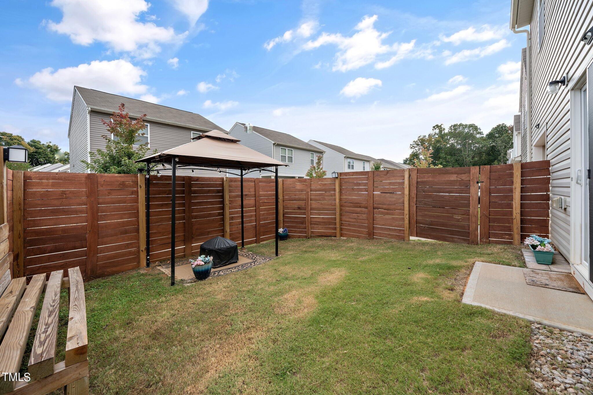 1060 North Gibson Road Mebane, NC 27302 - Photo 27 of 34 a view of a backyard with sitting area