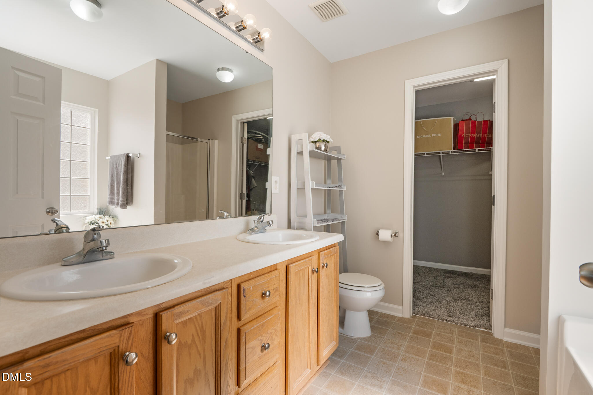 2019 Tennessee Road Durham, NC 27704 - Photo 20 of 28 a bathroom with a sink and a mirror