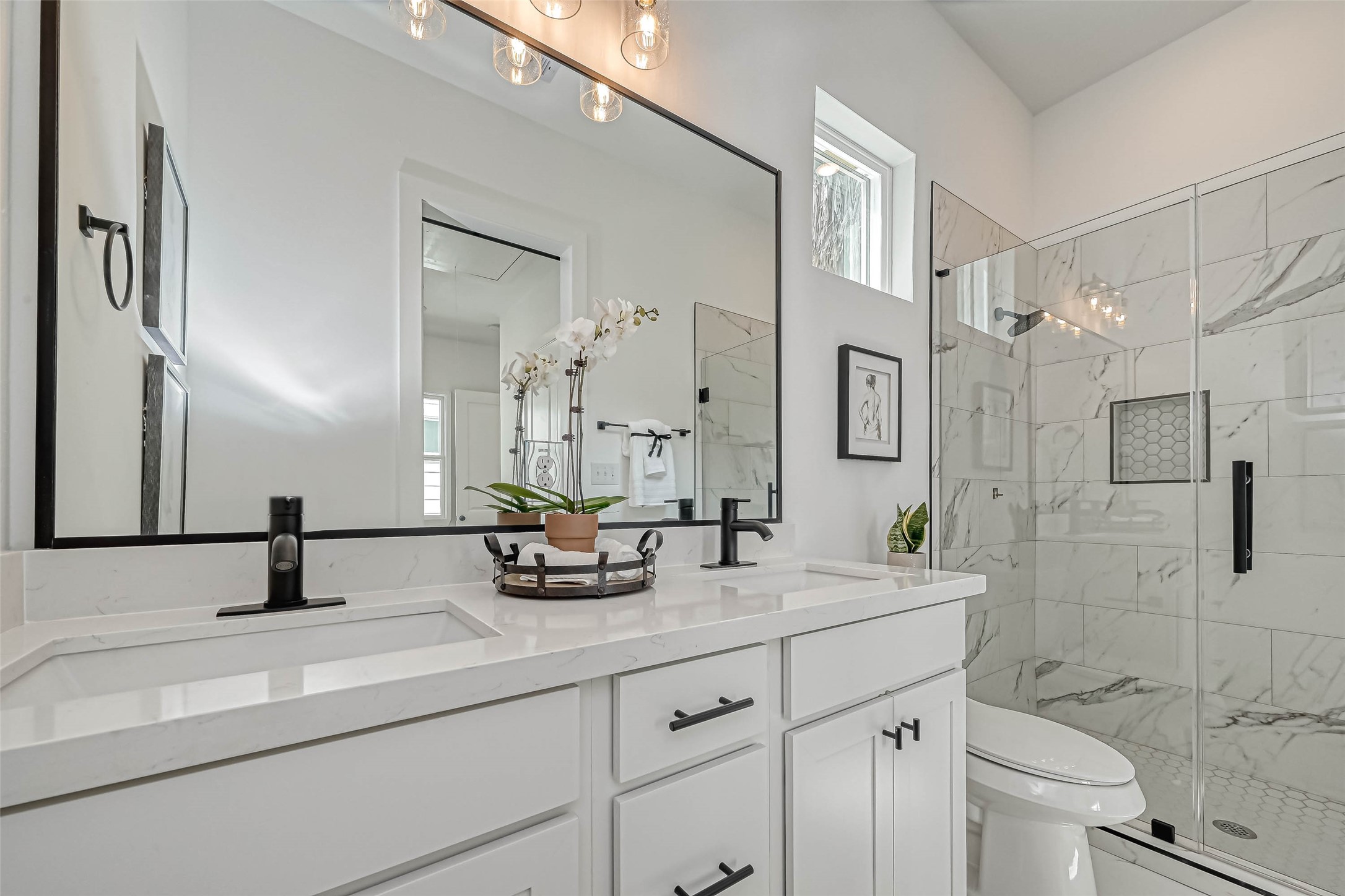 9316 Arledge Street, Unit B Houston, TX 77075 - Photo 18 of 26 a bathroom with a double vanity sink mirror double and toilet