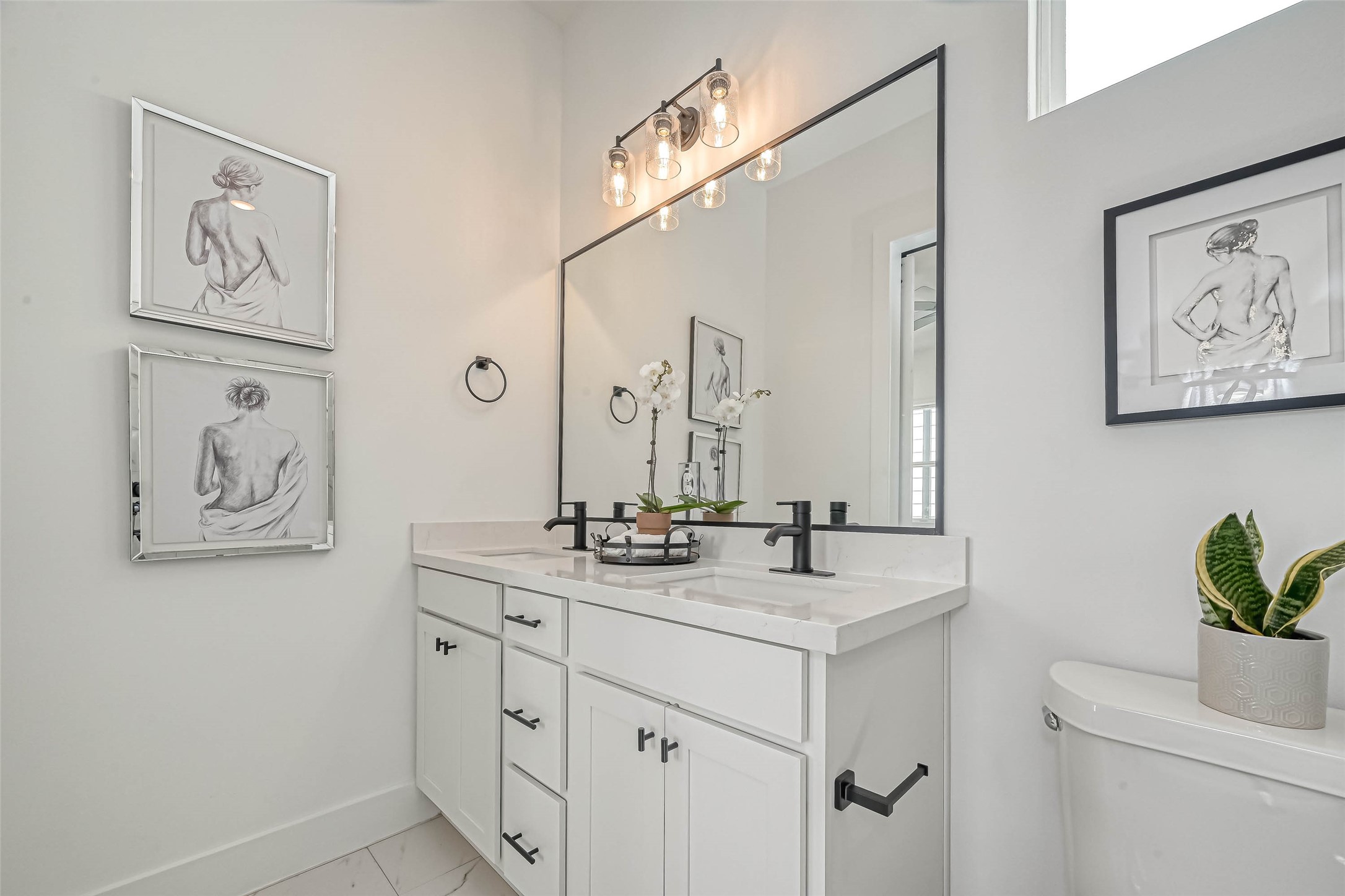 9316 Arledge Street, Unit B Houston, TX 77075 - Photo 19 of 26 a bathroom with a sink a vanity and a mirror