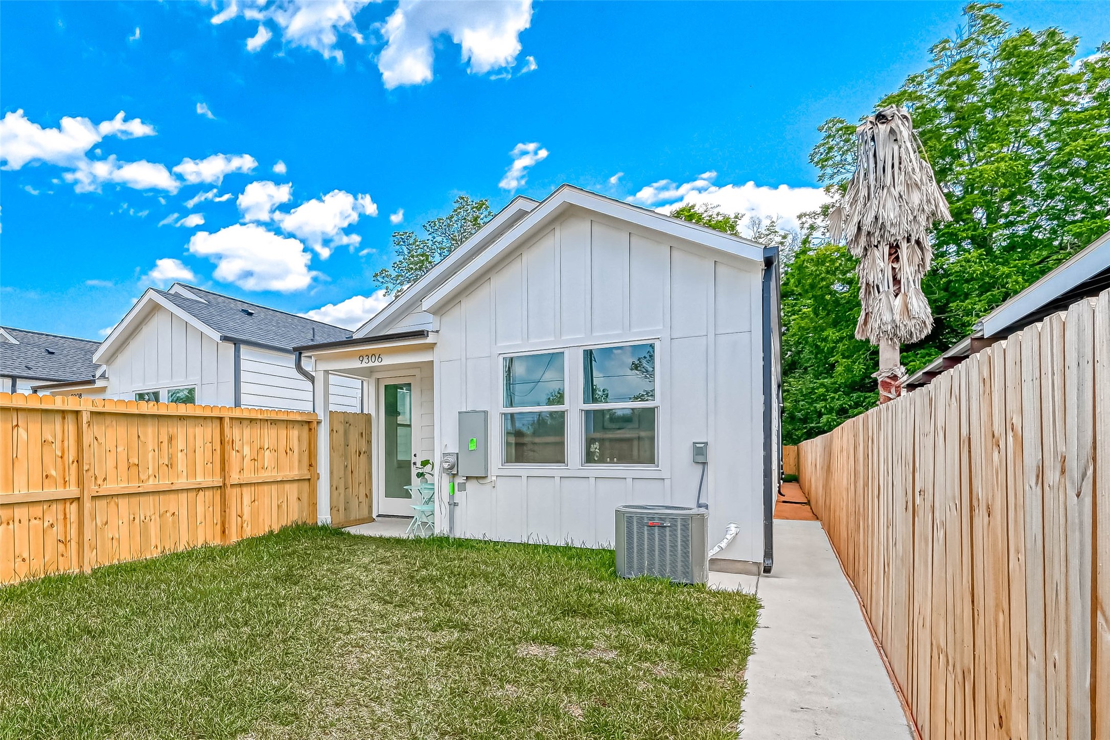 9316 Arledge Street, Unit B Houston, TX 77075 - Photo 23 of 26 a view of a house with wooden fence